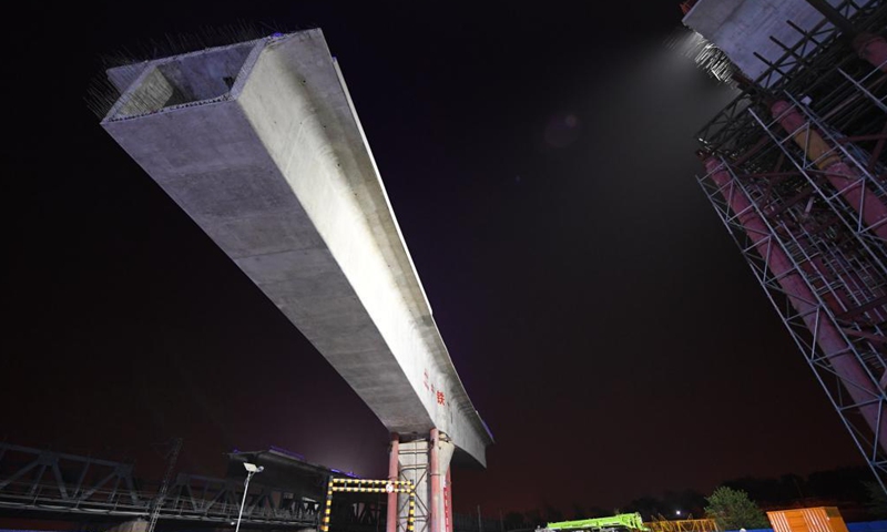 Photo taken on early May 8, 2021 shows the construction site of a swivel bridge along the Beijing-Guangzhou railway of the expansion project of the Fengtai railway station in Beijing, capital of China.Photo:Xinhua