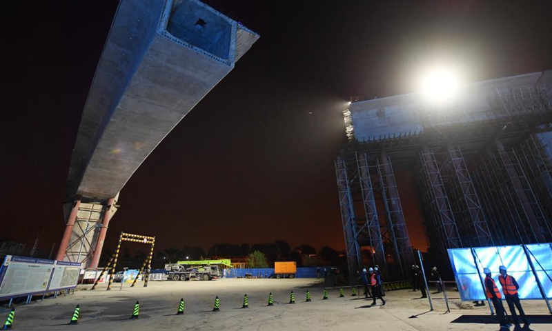 Photo taken on early May 8, 2021 shows the construction site of a swivel bridge along the Beijing-Guangzhou railway of the expansion project of the Fengtai railway station in Beijing, capital of China.Photo:Xinhua