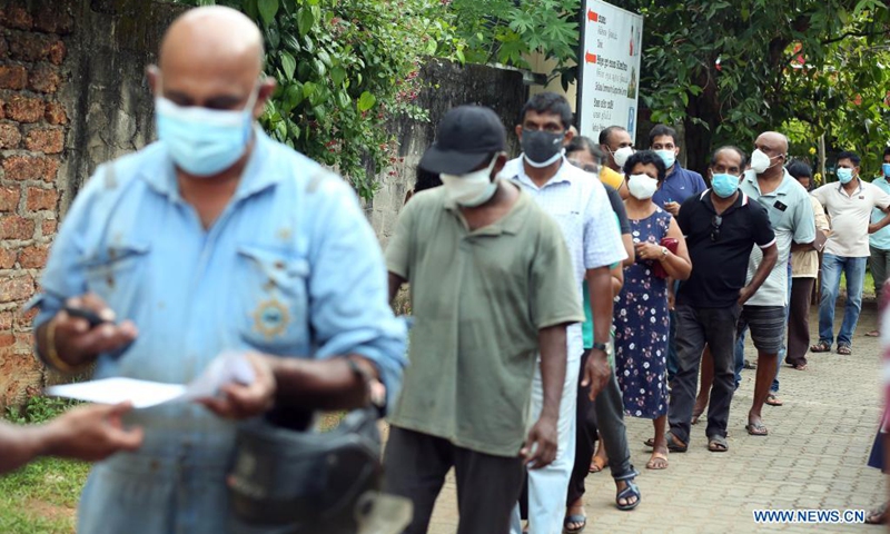 People line up to receive the Sinopharm vaccines at the Panadura Health Office in Kalutara District, in the outskirts of capital Colombo, Sri Lanka, on May 8, 2021. Sri Lanka's Health Ministry on Saturday began administering the Sinopharm vaccine to local nationals, soon after the World Health Organization (WHO) approved it for emergency use worldwide.(Photo: Xinhua)
