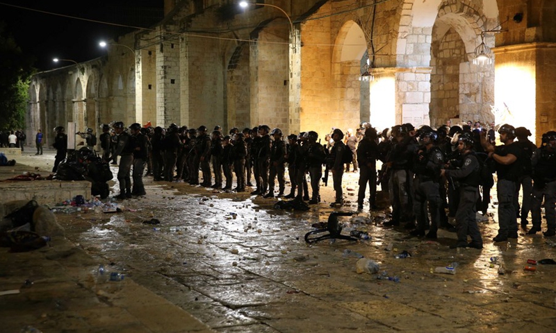 Israeli police are seen during clashes at the Al-Aqsa Mosque compound in East Jerusalem, on May 7, 2021.(Photo: Xinhua)