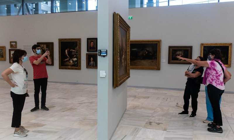 People visit the National Gallery in Athens, Greece, on May 14, 2021. All the museums in Greece reopened for the public on Friday as the strict measures against COVID-19 are lifted.Photo:Xinhua