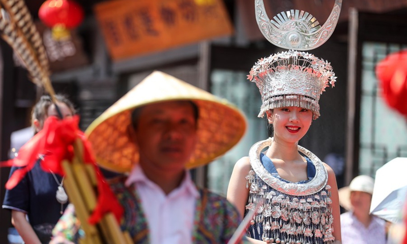 People of the Miao ethnic group are seen at Wanda Town of Danzhai County in Qiandongnan Miao and Dong Autonomous Prefecture, southwest China's Guizhou Province, May 15, 2021. (Photo: Xinhua)