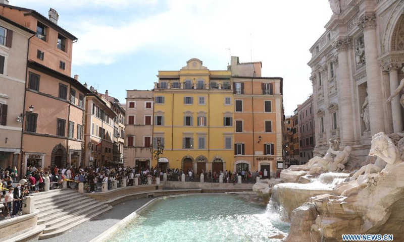 People visit the Fontana di Trevi in Rome, Italy, May 15, 2021. Italy formally opened its borders on Sunday for restriction-free travel for visitors from some countries. While it appeared that few took advantage of the eased travel rules on their first day, businesses in Rome say they are ready.(Photo: Xinhua)