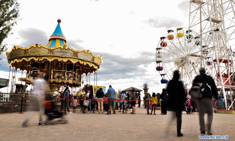 People spend time at Tibidabo Amusement Park in Barcelona, Spain, May 20, 2021. Tibidabo Amusement Park reopened to the public on May 15 after being closed for a year due to the COVID-19 pandemic.Photo:Xinhua