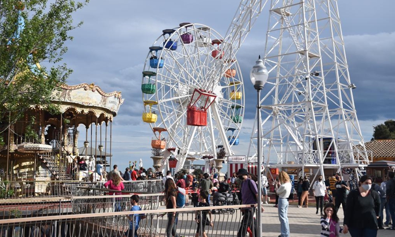 People spend time at Tibidabo Amusement Park in Barcelona, Spain, May 20, 2021. Tibidabo Amusement Park reopened to the public on May 15 after being closed for a year due to the COVID-19 pandemic.Photo:Xinhua