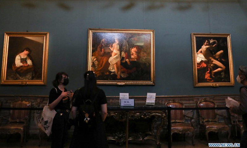 Visitors view exhibits at the Doria Pamphilj Gallery in Rome, Italy, May 21, 2021. As Italy began easing coronavirus health restrictions, many sites including the Doria Pamphilj Gallery have reopened to visitors, with a series of precautions being taken, such as limiting number of visitors and requiring visitors to reserve precise entry times.Photo:Xinhua