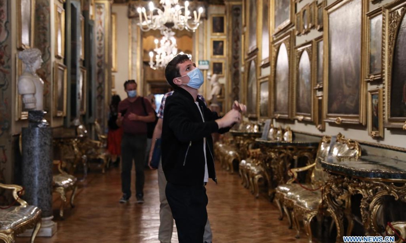 Visitors view exhibits at the Doria Pamphilj Gallery in Rome, Italy, May 21, 2021. As Italy began easing coronavirus health restrictions, many sites including the Doria Pamphilj Gallery have reopened to visitors, with a series of precautions being taken, such as limiting number of visitors and requiring visitors to reserve precise entry times.Photo:Xinhua