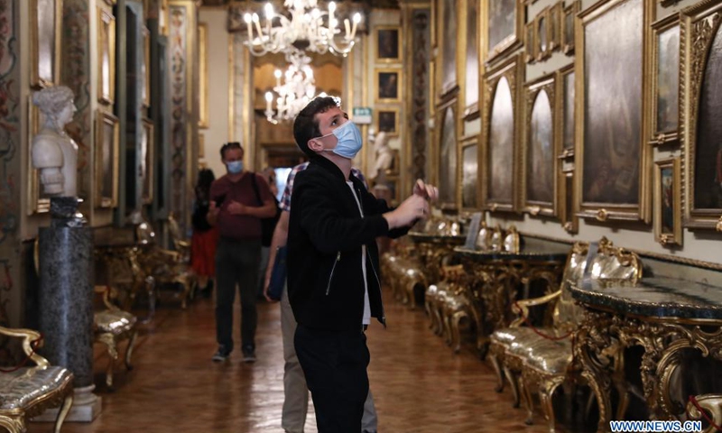 Visitors view exhibits at the Doria Pamphilj Gallery in Rome, Italy, May 21, 2021. As Italy began easing coronavirus health restrictions, many sites including the Doria Pamphilj Gallery have reopened to visitors, with a series of precautions being taken, such as limiting number of visitors and requiring visitors to reserve precise entry times.Photo:Xinhua