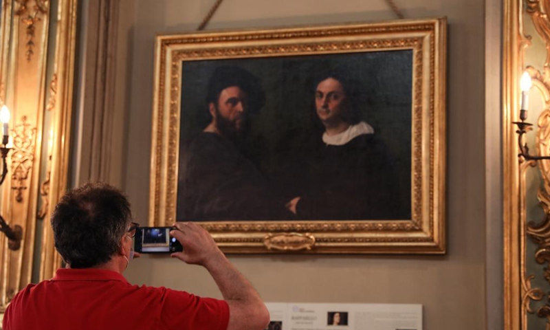 Visitors view exhibits at the Doria Pamphilj Gallery in Rome, Italy, May 21, 2021. As Italy began easing coronavirus health restrictions, many sites including the Doria Pamphilj Gallery have reopened to visitors, with a series of precautions being taken, such as limiting number of visitors and requiring visitors to reserve precise entry times.Photo:Xinhua