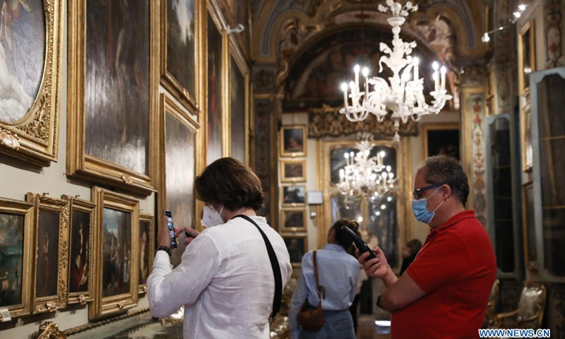 Visitors view exhibits at the Doria Pamphilj Gallery in Rome, Italy, May 21, 2021. As Italy began easing coronavirus health restrictions, many sites including the Doria Pamphilj Gallery have reopened to visitors, with a series of precautions being taken, such as limiting number of visitors and requiring visitors to reserve precise entry times.Photo:Xinhua