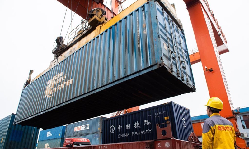 A logistic man works at Changsha north railway station in Changsha, central China's Hunan Province on May 22, 2021. Train X8426 left Changsha to Minsk on Saturday, carrying machinery parts, textiles, electronic products and other goods from Hunan and neighboring provinces. Over 1,200 freight train trips from Hunan to Europe have been made since October 2014. (Photo: Xinhua)