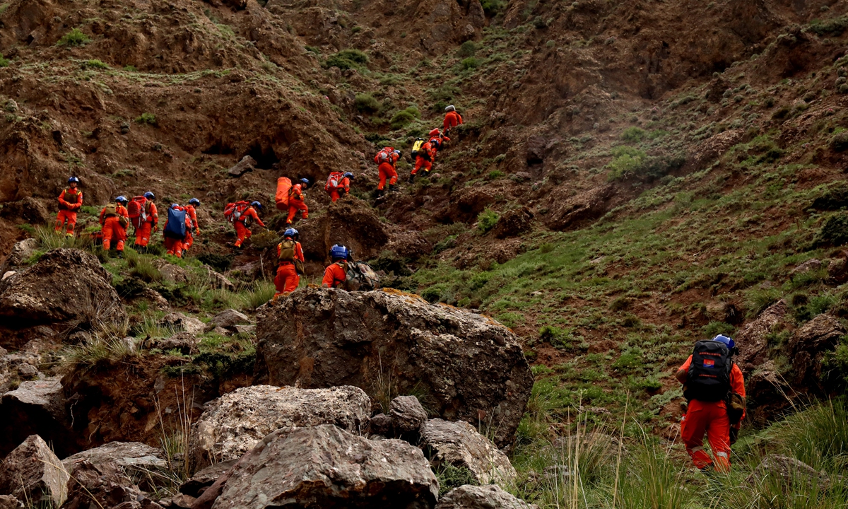 Rescue team members searching for missing marathon runners in the Yellow River Stone Forest tourist site in Jingtai county, Baiyin, Northwest China's Gansu Province. Photo: Xinhua