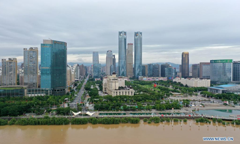 Aerial photo taken on May 23, 2021 shows trees immersed in water along the Ganjiang River in Nanchang, east China's Jiangxi Province. Water level of Ganjiang River has been rising due to the torrential rain.(Photo: Xinhua)