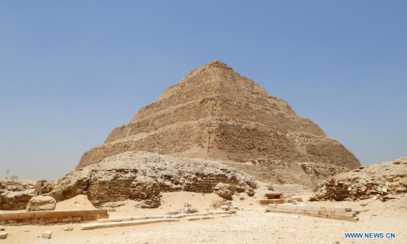 Photo taken on May 26, 2021 shows the Step Pyramid in the Saqqara necropolis near the capital Cairo, Egypt. The Step Pyramid, a UNESCO World Heritage Site, was designed and built by the architect Imhotep in the 27th century BC during the Third Dynasty to hold the mummy of Pharaoh Djoser.(Photo: Xinhua)