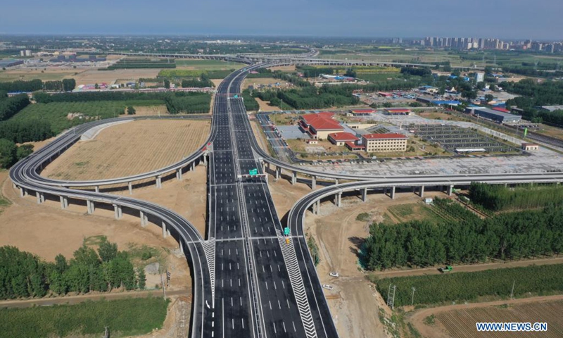 Aerial photo taken on May 26, 2021 shows the Xiong'an North service area of the new route of Rongcheng-Wuhai expressway in north China's Hebei Province. The Hebei section of Beijing-Xiong'an expressway, the new route of Rongcheng-Wuhai expressway and the first phase of Beijing-Dezhou expressway opened to traffic on Saturday.(Photo: Xinhua)