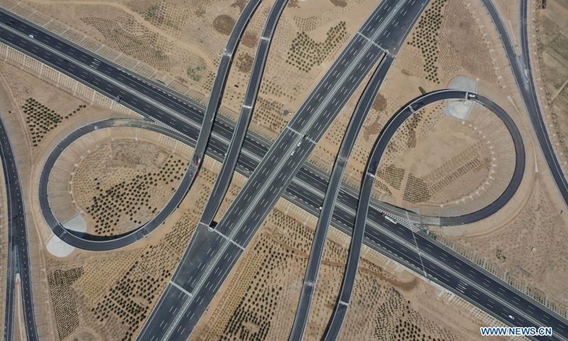 Aerial photo taken on May 10, 2021 shows a junction of the first phase of Beijing-Dezhou expressway and Tianjin-Shijiazhuang expressway in north China's Hebei Province. The Hebei section of Beijing-Xiong'an expressway, the new route of Rongcheng-Wuhai expressway and the first phase of Beijing-Dezhou expressway opened to traffic on Saturday.(Photo: Xinhua)