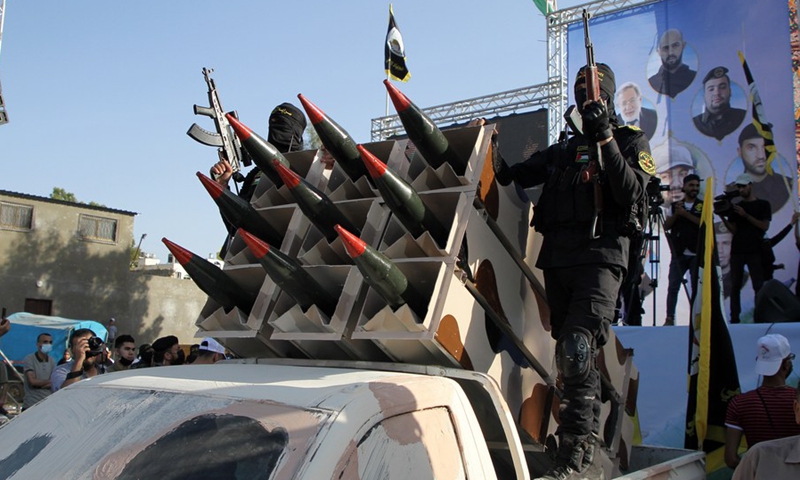 The Saraya al-Quds brigades, the military wing of the Palestinian Islamic Jihad movement, holds a parade to show off its truck-mounted rockets and other weapons, in Gaza City, on May 29, 2021.(Photo: Xinhua)