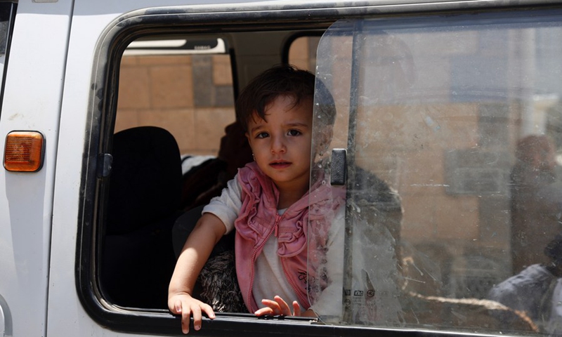 A Yemeni child is seen inside a car in Sanaa, Yemen on May 30, 2021.(Photo: Xinhua)