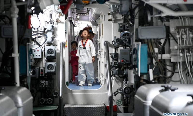 Children visit a military culture park in Yinchuan, northwest China's Ningxia Hui Autonomous Region, May 30, 2021. Fire fighting department of Xingqing District in Yinchuan City on Sunday organized the visit for fire fighters and their children to greet the upcoming International Children's Day.(Photo: Xinhua)