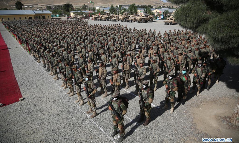 Members of Afghan special forces take part in their graduation ceremony at a military training center in Kabul, capital of Afghanistan, on May 31, 2021. A total of 437 new cadets have graduated from a commando school and joined the Afghan national army, the Afghan Ministry of Defense said on Monday.(Photo: Xinhua)