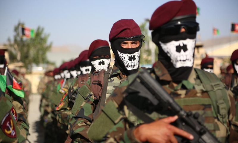 Members of Afghan special forces take part in their graduation ceremony at a military training center in Kabul, capital of Afghanistan, on May 31, 2021. A total of 437 new cadets have graduated from a commando school and joined the Afghan national army, the Afghan Ministry of Defense said on Monday.(Photo: Xinhua)