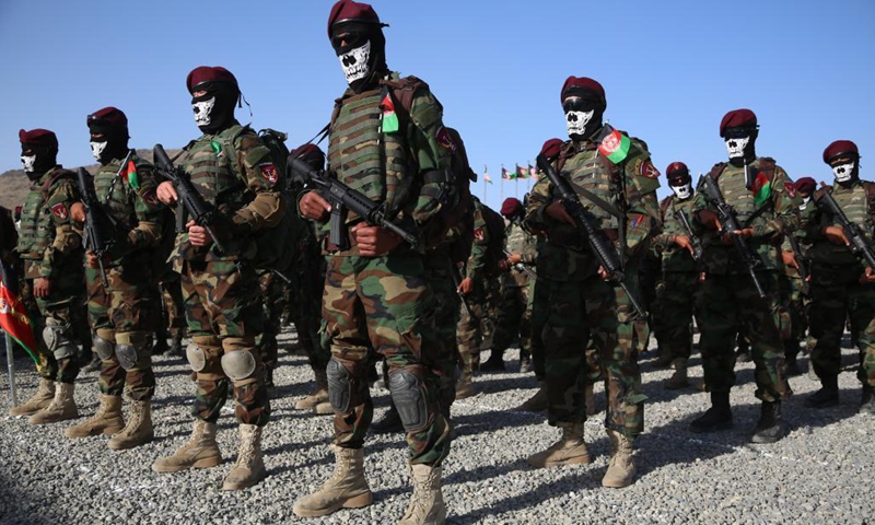 Members of Afghan special forces take part in their graduation ceremony at a military training center in Kabul, capital of Afghanistan, on May 31, 2021. A total of 437 new cadets have graduated from a commando school and joined the Afghan national army, the Afghan Ministry of Defense said on Monday.(Photo: Xinhua)