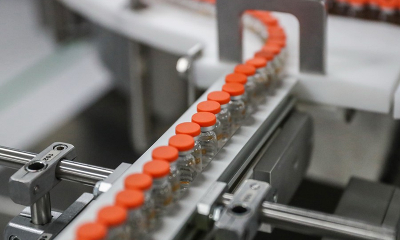 Photo taken on Jan. 6, 2021 shows the packing line for inactivated COVID-19 vaccine of Sinovac Biotech, a Chinese biopharmaceutical company, in Beijing, capital of China.(Photo: Xinhua)