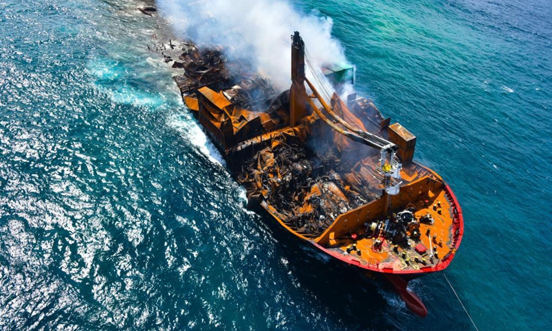 Photo taken on June 2, 2021 shows part of the X Press Pearl, a container ship burnt near the Colombo Port, in Colombo, Sri Lanka. The Sri Lankan Navy on Wednesday said that operations to tow the burnt X Press Pearl ship had been halted after the rear end of the vessel had hit the sea bed.(Photo: Xinhua)