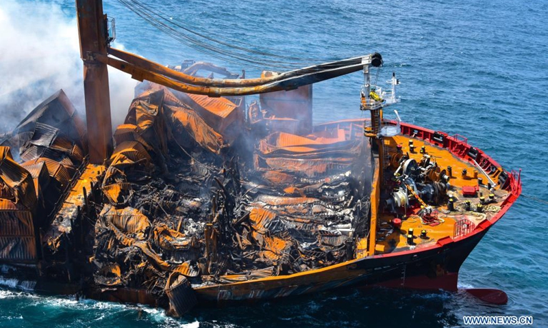 Photo taken on June 2, 2021 shows part of the X Press Pearl, a container ship burnt near the Colombo Port, in Colombo, Sri Lanka. The Sri Lankan Navy on Wednesday said that operations to tow the burnt X Press Pearl ship had been halted after the rear end of the vessel had hit the sea bed.(Photo: Xinhua)