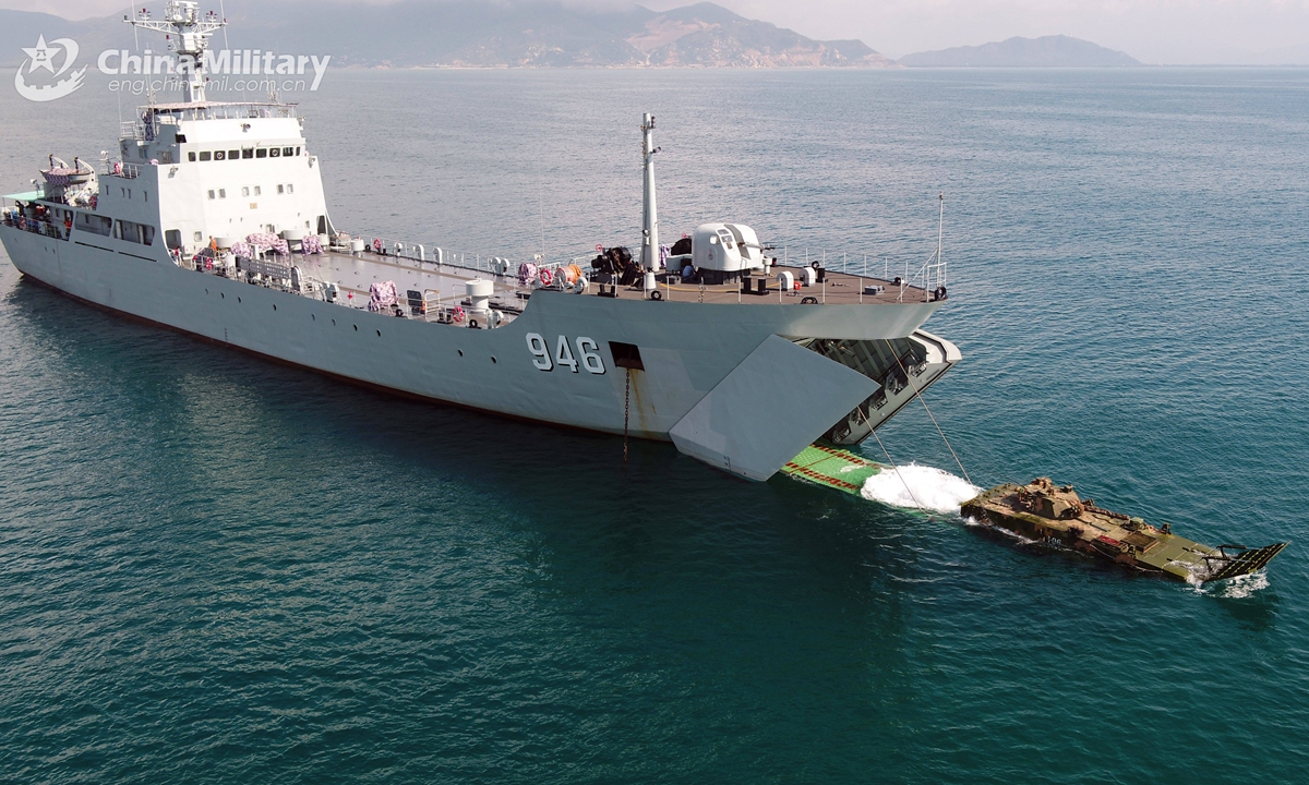 An amphibious armored infantry fighting vehicles (IFV) steers off the well deck of a landing ship during the several-week-long realistic combat training jointly conducted by a naval landing ship flotilla under the PLA Southern Theater Command and a combined arms brigade under the PLA 74th Group Army in mid-May, 2021. Photo: China Military Online