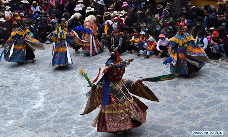 Buddhist monks perform Cham dance at the Drigung Monastery in Lhasa, southwest China's Tibet Autonomous Region, June 9, 2021. Cham dance is a masked and costumed ritual performed by Tibetan Buddhist monks.Photo:Xinhua