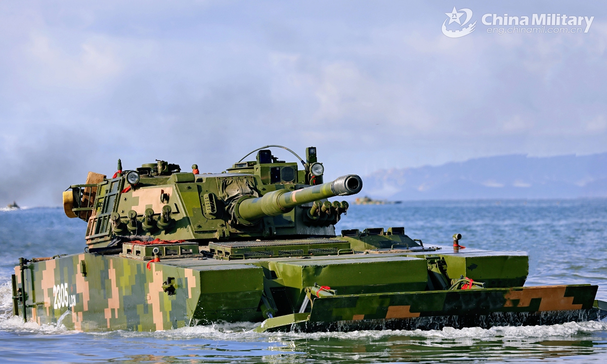 An amphibious armored infantry fighting vehicle (IFV) attached to a brigade under the PLA 72nd Group Army maneuvers towards the designated target area during an amphibious training exercise focused on subjects of basic driving, landing craft ferrying and assault wave formation, etc. on May 21, 2021.Photo:China Military