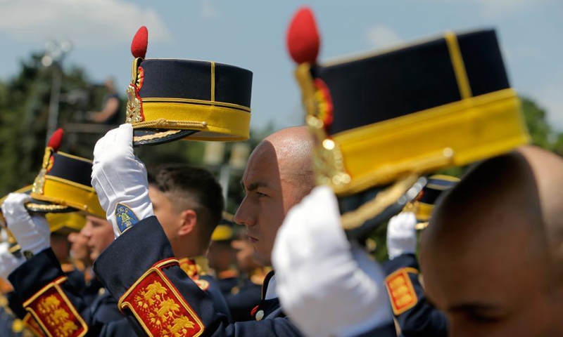 Honour guards attend a ceremony marking the Heroes' Day at the Tomb of the Unknown Soldier in Bucharest, Romania, on June 10, 2021. Photo: China News Service