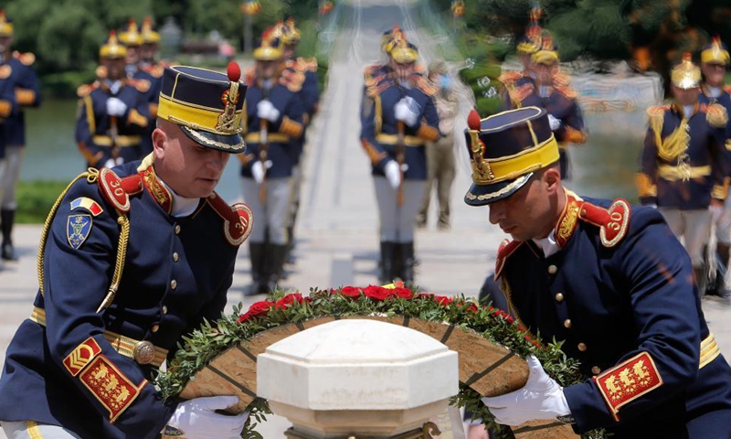 Honour guards attend a ceremony marking the Heroes' Day at the Tomb of the Unknown Soldier in Bucharest, Romania, on June 10, 2021. Photo: China News Service
