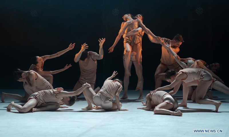 Members of Szeged Contemporary Dance Company perform their new piece Blue during a dress rehearsal at National Dance Theatre in Budapest, Hungary on June 11, 2021. (Photo by Attila Volgyi/Xinhua)