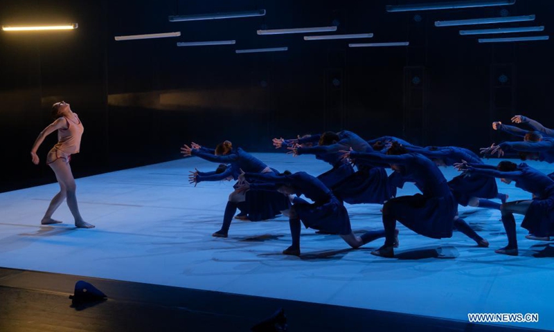 Members of Szeged Contemporary Dance Company perform their new piece Blue during a dress rehearsal at National Dance Theatre in Budapest, Hungary on June 11, 2021. (Photo by Attila Volgyi/Xinhua)