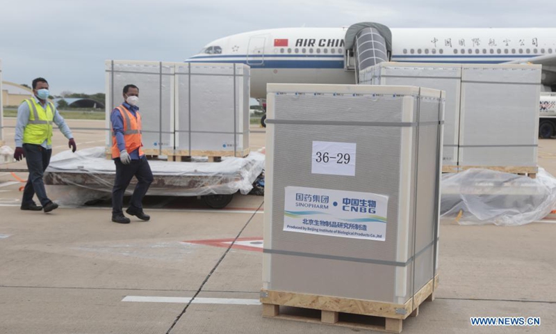 Photo taken on June 12, 2021 shows boxes of Chinese COVID-19 vaccines arriving at the Phnom Penh International Airport in Phnom Penh, Cambodia. Cambodia Saturday received another batch of China's Sinopharm COVID-19 vaccine, boosting the Southeast Asian nation in its inoculation drive. Cambodian health ministry's secretary of state Yok Sambath, who welcomed the vaccine's arrival at the Phnom Penh International Airport, said the vaccine was purchased from Chinese pharmaceutical company Sinopharm. (Photo by Sovannara/Xinhua)