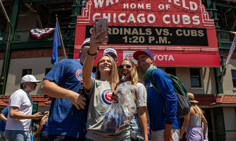 People take a selfie at Wrigley Field in Chicago, the United States, on June 11, 2021. U.S. Midwest state of Illinois, including the country's third largest city of Chicago, fully reopened on Friday amid jitters.Photo: Xinhua