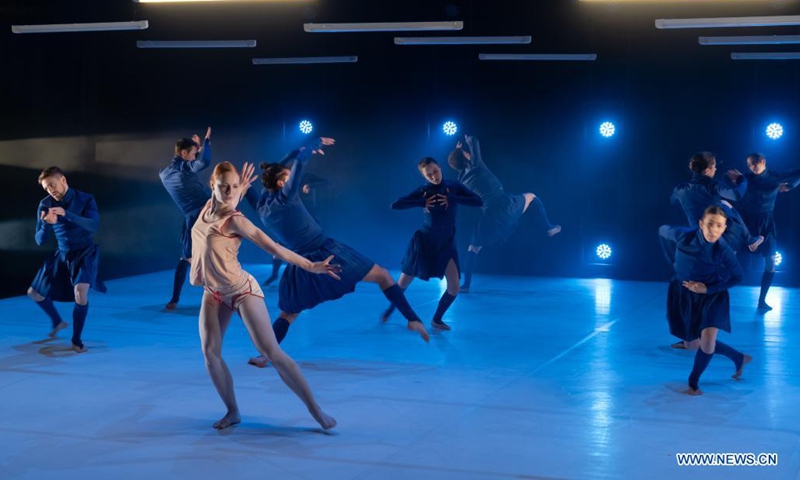 Members of Szeged Contemporary Dance Company perform their new piece Blue during a dress rehearsal at National Dance Theatre in Budapest, Hungary on June 11, 2021. (Photo by Attila Volgyi/Xinhua)