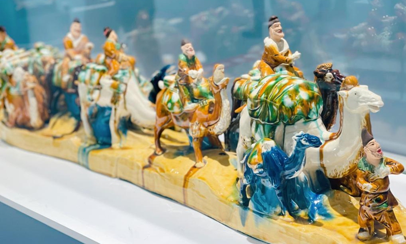 Tri-colored glazed potteries are displayed at an exhibition held on the occasion of China's Cultural and Natural Heritage Day in Shanghai, east China, June 12, 2021. An exhibition of Chinese traditional handicrafts was held on Saturday, this year's Cultural and Natural Heritage Day. Since 2006, China has celebrated cultural heritage day on the second Saturday of June. In 2017, it was renamed Cultural and Natural Heritage Day. (Xinhua/Sun Liping)