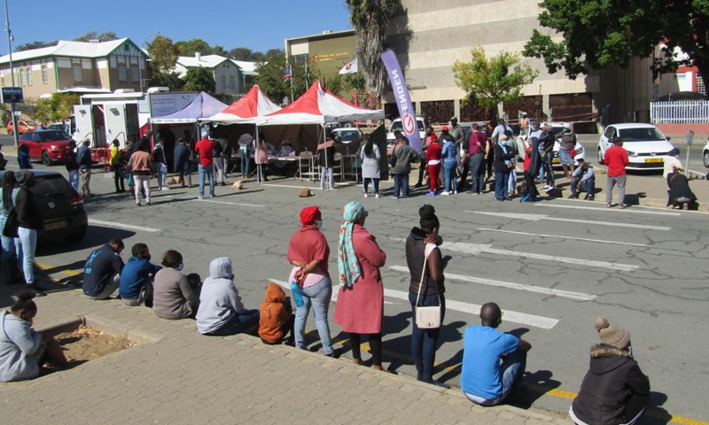 People line up to get COVID-19 tests at a testing site in Windhoek, Namibia, June 11, 2021. Namibia on Thursday recorded 1,045 COVID-19 cases, the highest daily increase since the coronavirus was reported in March last year, said Health Minister Kalumbi Shangula.  Photo: Xinhua