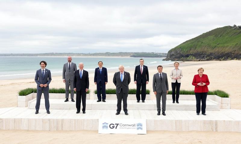 (From L to R, Front) Canadian Prime Minister Justin Trudeau, U.S. President Joe Biden, British Prime Minister Boris Johnson, French President Emmanuel Macron, German Chancellor Angela Merkel, (From L to R, Rear) European Council President Charles Michel, Japanese Prime Minister Yoshihide Suga, Italian Prime Minister Mario Draghi and European Commission President Ursula von der Leyen, stand for a photo in Carbis Bay, Cornwall, Britain, on June 11, 2021.(Photo: Xinhua)