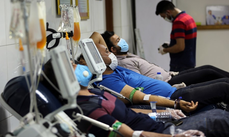Patients recovered from COVID-19 donate plasma at the National Blood Transfusion Center in Baghdad, Iraq, June 28, 2020. (Photo: Xinhua)