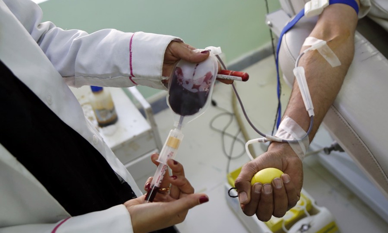 A donator donates blood at a blood center of Sanaa, Yemen, on Feb. 13, 2021.(Photo: Xinhua)