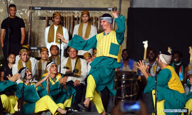 Actors perform at the closing ceremony of the 8th International Festival for Drums and Traditional Arts at Saladin Citadel in Cairo, Egypt, on June 18, 2021. The 8th International Festival for Drums and Traditional Arts concluded here on Friday.Photo:Xinhua