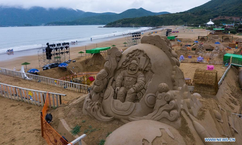 Aerial photo taken on June 19, 2021 shows sand creations for the upcoming 22nd Zhoushan International Sand Sculpture Festival in Zhoushan, east China's Zhejiang Province. Over 20 sand sculptors have been busy making more than 60 creations to be displayed during the 22nd Zhoushan International Sand Sculpture Festival in Zhoushan since late May. Their works are slated to be completed by late June.(Photo: Xinhua)