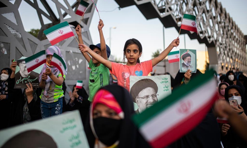 Supporters celebrate after Ebrahim Raisi won the presidential election in Tehran, Iran, on June 19, 2021. Judiciary Chief Ebrahim Raisi won Iran's presidential race by securing over 60 percent of votes, the Iranian Interior Ministry announced on Saturday.(Photo: Xinhua)