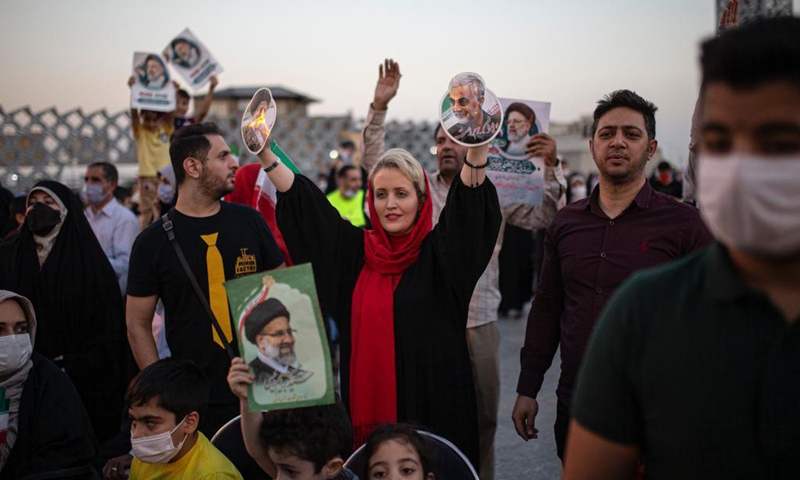 Supporters celebrate after Ebrahim Raisi won the presidential election in Tehran, Iran, on June 19, 2021. Judiciary Chief Ebrahim Raisi won Iran's presidential race by securing over 60 percent of votes, the Iranian Interior Ministry announced on Saturday.(Photo: Xinhua)