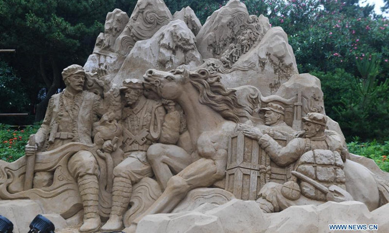 Photo taken on June 19, 2021 shows a sand creation for the upcoming 22nd Zhoushan International Sand Sculpture Festival in Zhoushan, east China's Zhejiang Province. Over 20 sand sculptors have been busy making more than 60 creations to be displayed during the 22nd Zhoushan International Sand Sculpture Festival in Zhoushan since late May. Their works are slated to be completed by late June.(Photo: Xinhua)
