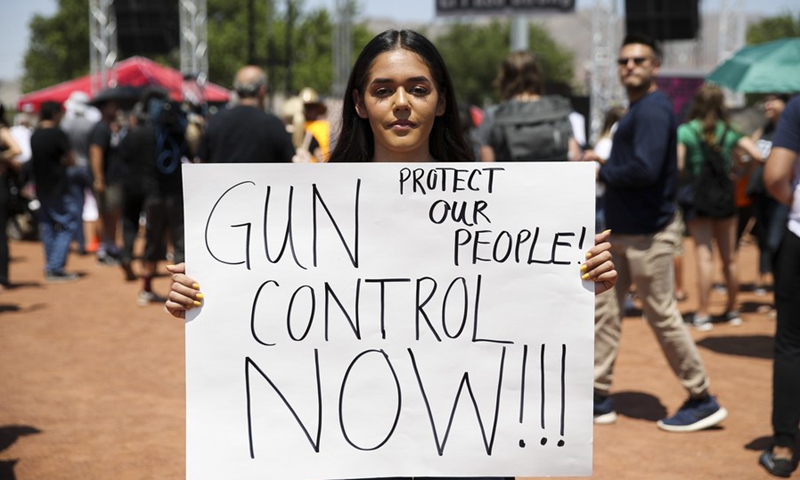 College student Jennifer Estrada takes part in a rally for gun control and anti-racism, in El Paso, Texas, the United States, Aug. 7, 2019.(Photo: Xinhua)